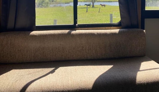 Cosy van in private setting with stunning views of the Hunter River.