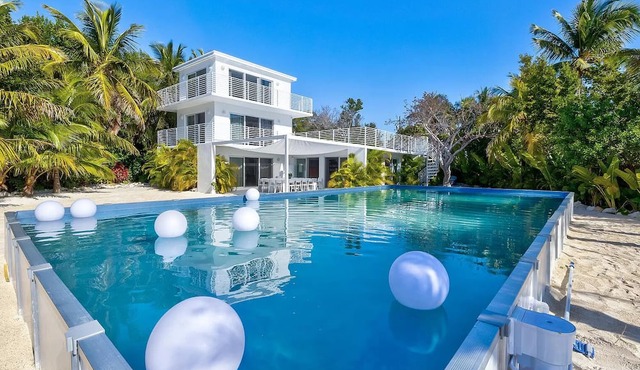 Modern ocean side estate: 5 bed - 6 bath, big pool, 2 rooftops, small dock