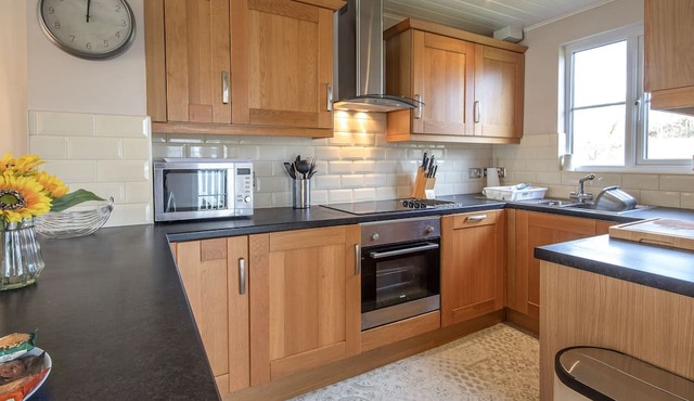 A new england lakeside lodge that sleeps 6 guests in 3 bedrooms