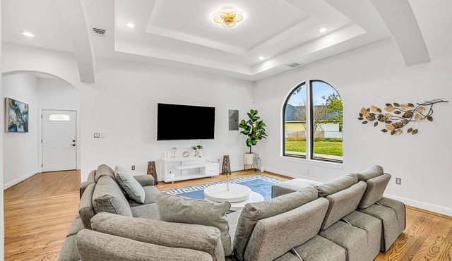 Stunning and luxe ranch-style home with large patio, grill, air hockey, firepit