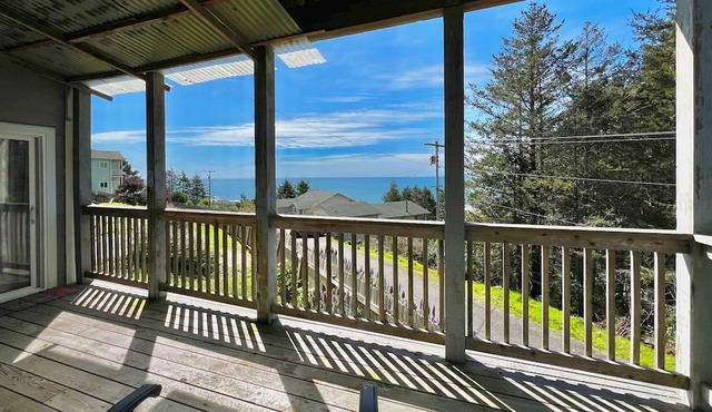 Dog-friendly wave-view home with beach access, firepit, grill, & enclosed yard