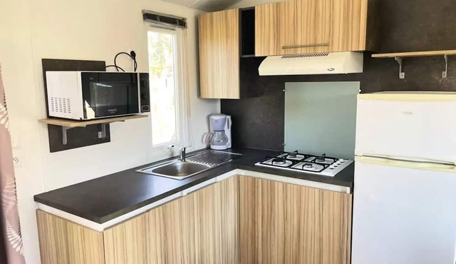 CAMPING O BEAU LAURIER ** - Mobile home Ibiza 58 4 to 6 people - 4 people. included in the price