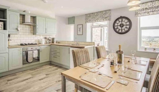 Homely three bedroom cottage with log burner.