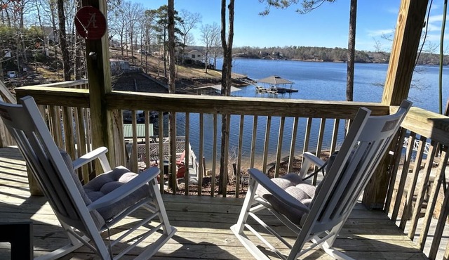Lakeside cottage with plenty of room . Multiple decks with easy access to water.