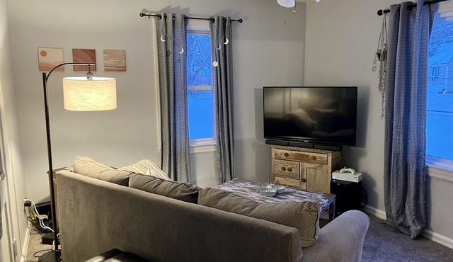 This charming bungalow is located 5 minutes from downtown! A cozy family home.