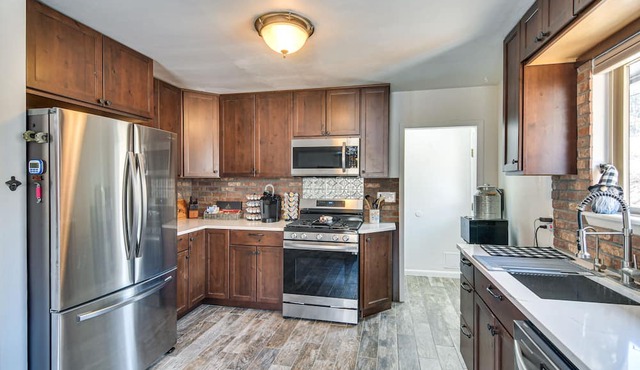 Riverfront Pine Cabin w/ Hot Tub & Mountain Views!