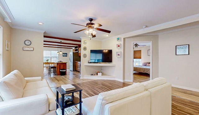 Sunny dog-friendly home with a pool, balcony, smart TVs, washer/dryer, & AC
