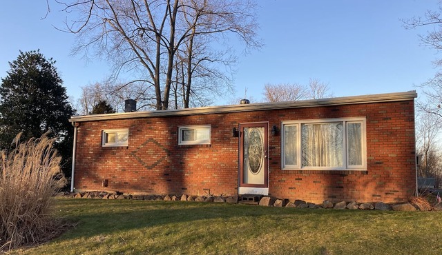 Three bedroom rancher in a quiet country setting off street parking