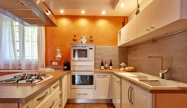 This farmhouse in Entraigues sur la Sorgue offers a spacious retreat.