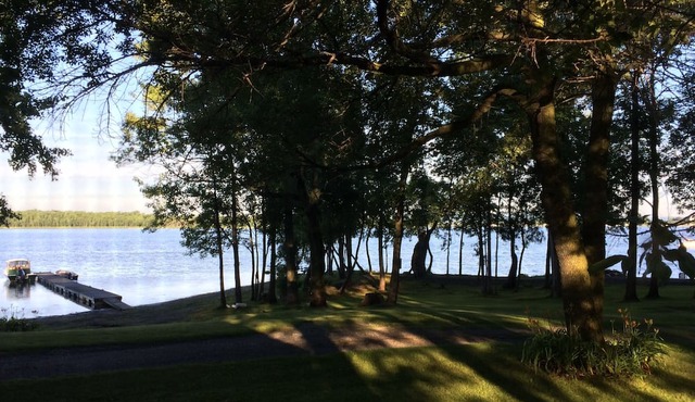 Cozy 2-bedroom lakefront house in enchanting Grand Isle for the eclipse.