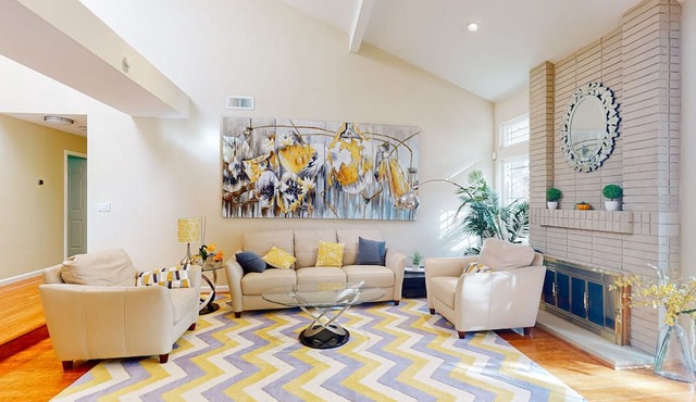 Inviting home near downtown with enclosed backyard, streaming, W/D, & patio