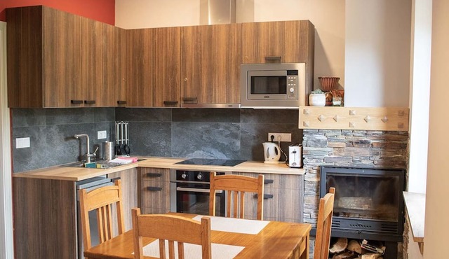 Apartamento tipo loft en una casa de estilo Modernista en el bosque.n