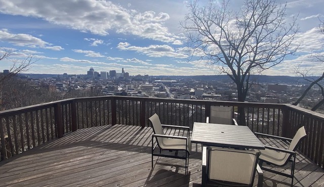 Two-Story Luxurious Condo with Deck and Amazing City Views Close to the Action