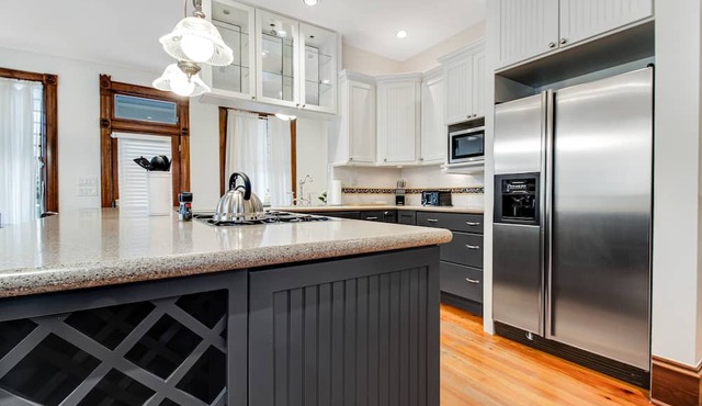 Spacious & sun-filled retreat with a large patio, game room, & great location