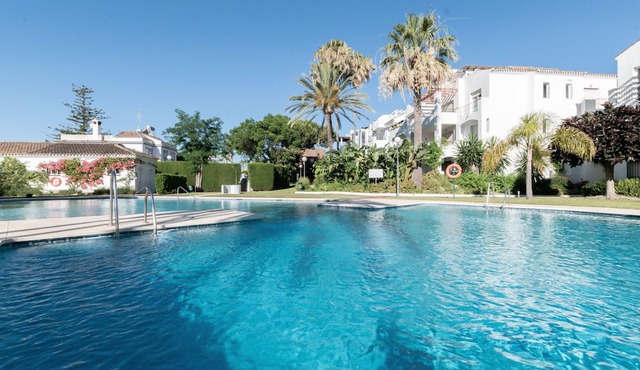 Apartment 'Encantador Ático En Sun Beach' with Mountain View, Wi-Fi and Air Conditioning