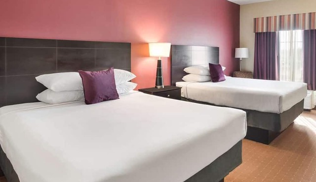 3 Budget-Friendly Accommodations in Knights Inn Bunkie! Pool, Free Breakfast!