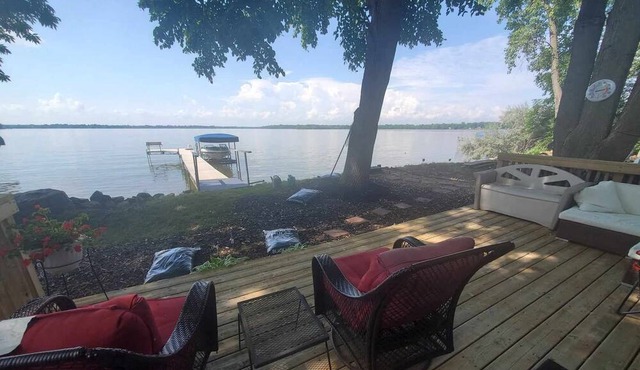 40 Min from the cities, 4 ft from the shore! Sandy beach. Fish off the dock!