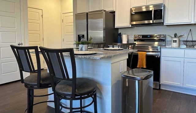 2 bedroom, 3 bath 2 car garage townhome with a short drive to everywhere