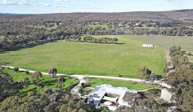 Bring everyone together in this Heathcote Homestead with pool & vineyard.