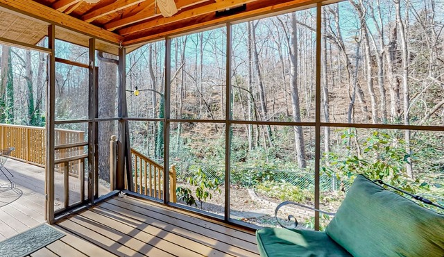 Dog-friendly home near Clemson with tree-lined yard, patio & deck