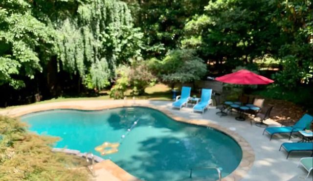 Private acreage with in-ground pool, sunroom, & two kitchens - dog-friendly