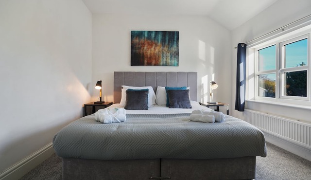 Cottage Cross: Spacious 2-Bed Charm, Where Home Whispers Warmth and Comfort!