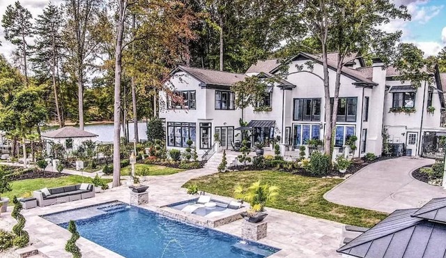 New Listing! The White Lotus - Luxurious Waterfront home on Lk Norman - Pool - Private Beach - Dock
