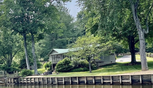 Relax at Pretty Point on Lake Hickory with amazing lake views throughout house!
