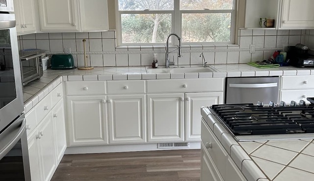 Country home located on a 10 acre olive farm in Historic Byron.