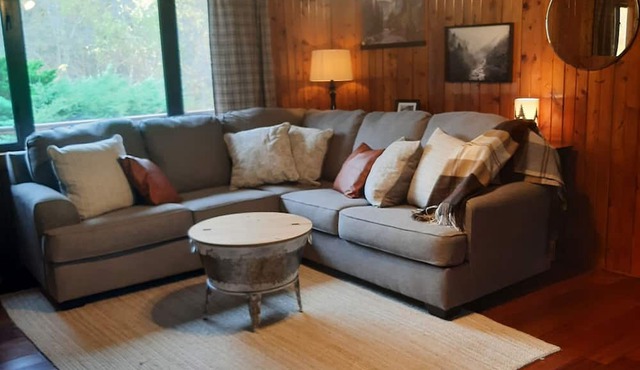 Log cabin style duplex on 150 acres of beautifully serene wooded farmland
