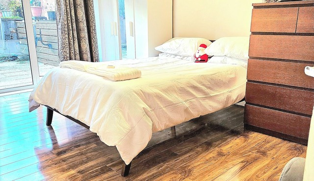 Spacious Retreat with Private Balcony & City Views