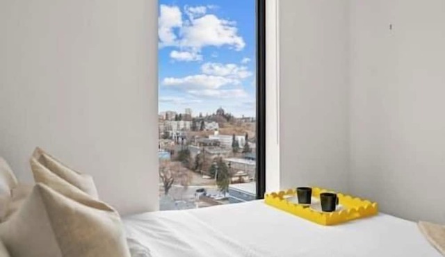 Mins to Saddledome | 2BR | Rooftop Patio | UG Park