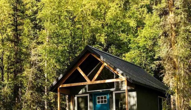Picturesque Cabin Nestled Amidst Trees in Anchorage, Alaska