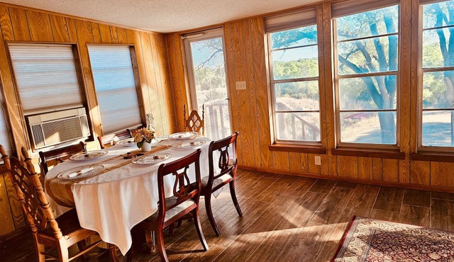 A spacious vintage cabin with 6 bedrooms and 2.5 bathrooms.