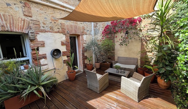 Village house with patio