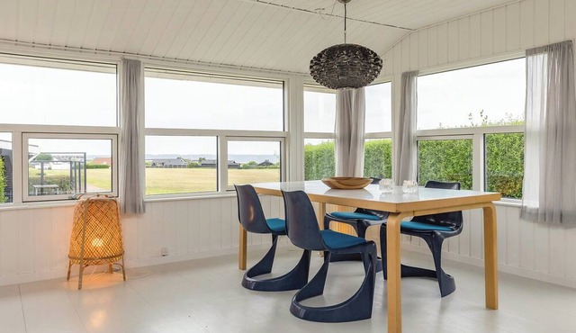 Black timber house with sea view in Karrebæksminde