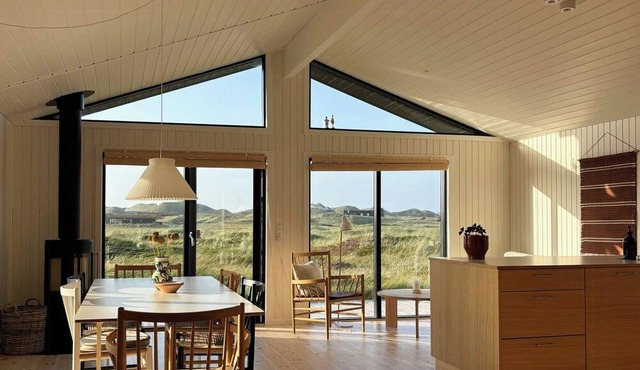 Nordic-style house with views of the landscape