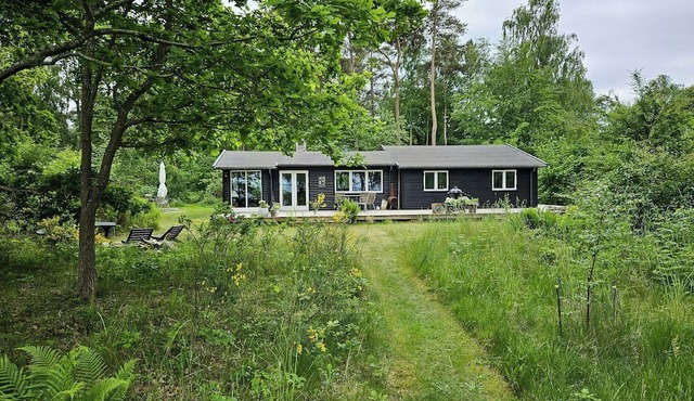Cottage in the front row to Sejerø Bay