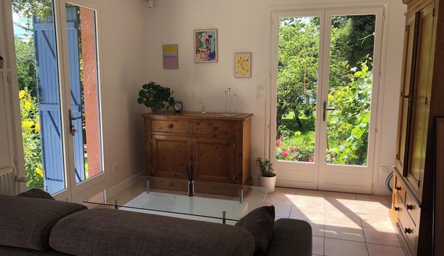 A self-contained studio in a green setting