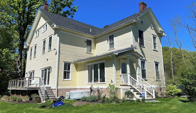 Large Hudson Valley country retreat, directly on the Hudson River, private beach