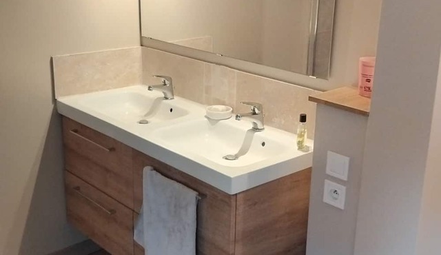 Quiet house on the edge of a forest next to a lake